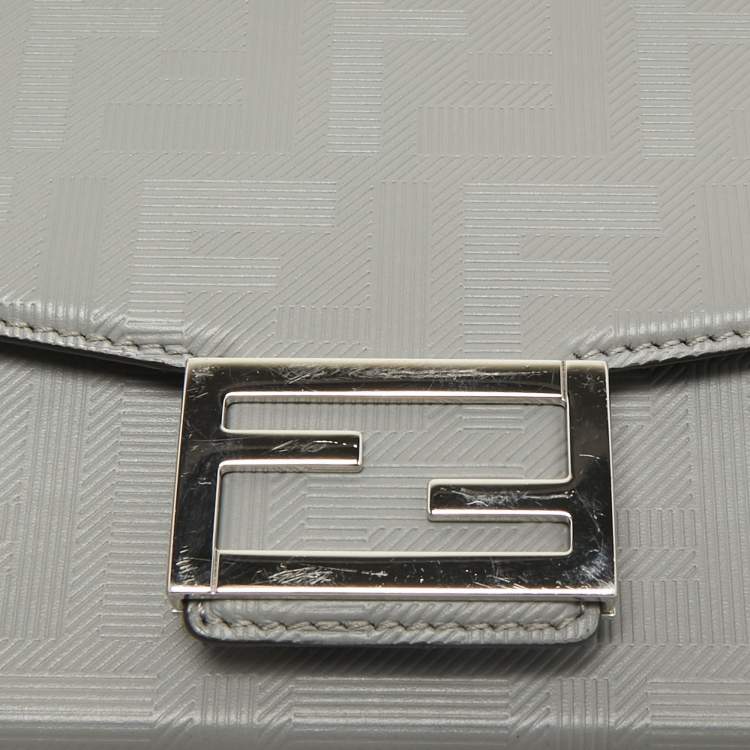 Pre Owned Fendi Grey FF Embossed Leather Soft Trunk Baguette Bag