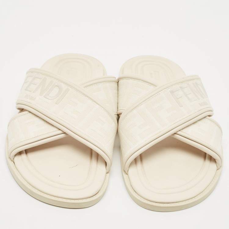 Pre Owned Fendi Off White Zucca Fabric and Leather Crisscross Flat Slides Size 42