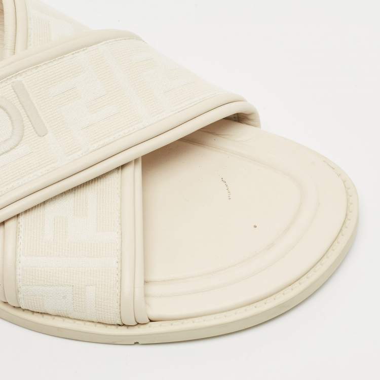 Pre Owned Fendi Off White Zucca Fabric and Leather Crisscross Flat Slides Size 42