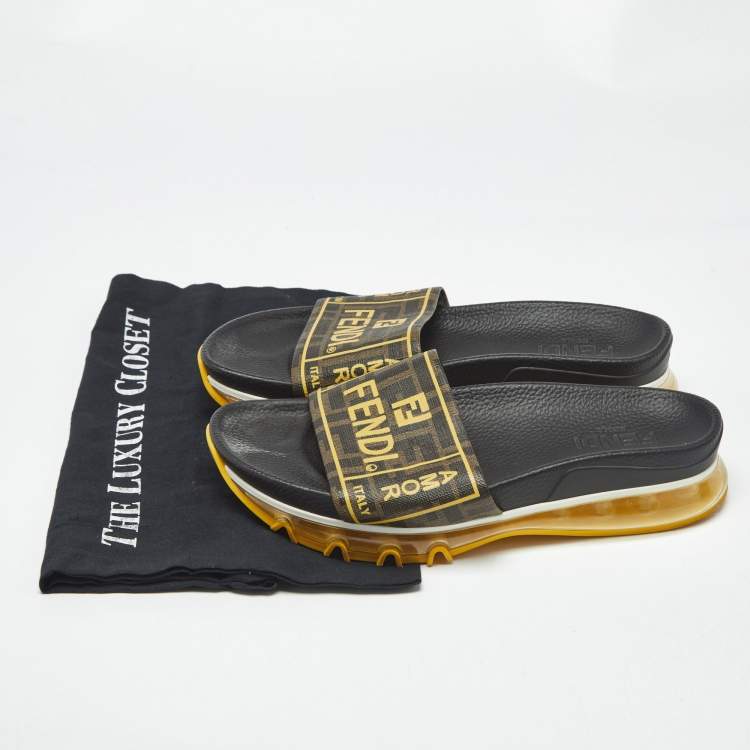 Pre Owned Fendi Brown Zucca Logo Print Coated Canvas Clear Sole Slide Sandals Size 41.5