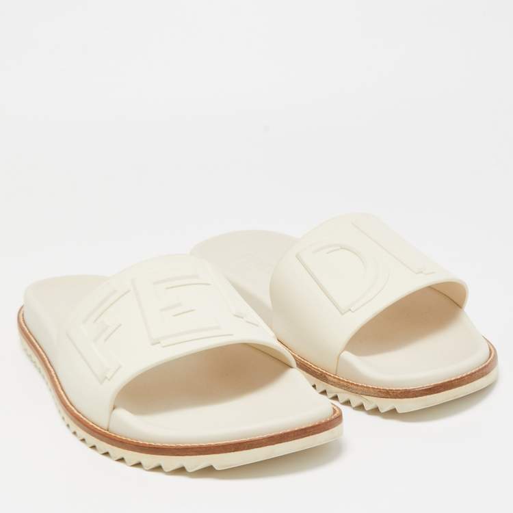 Pre Owned Fendi Cream Rubber Embossed Logo Slides Size 45
