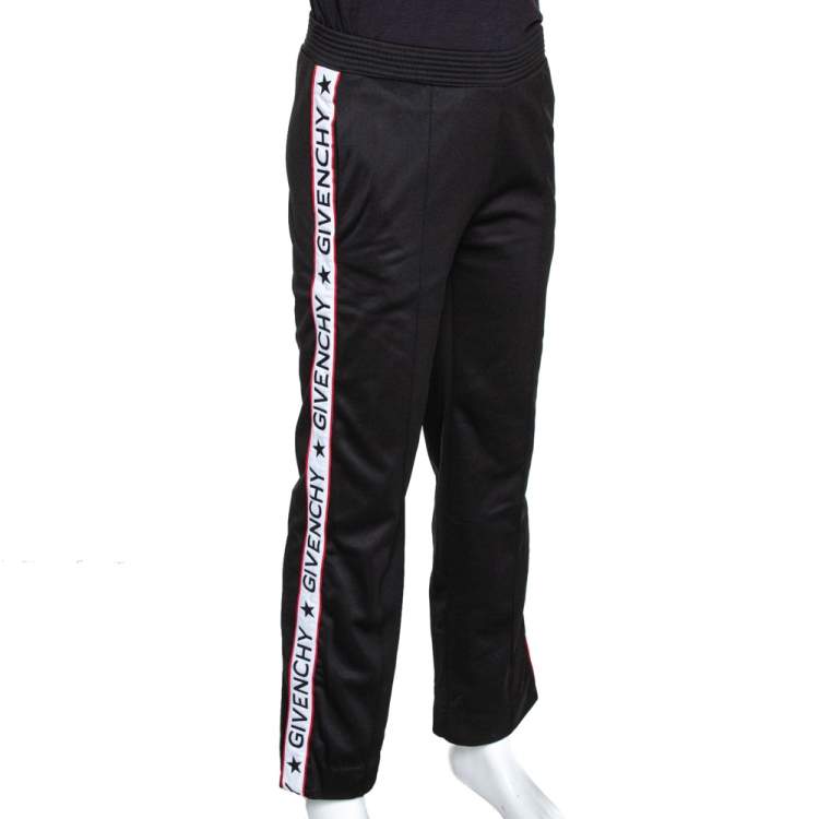 Logo cotton jersey sweatpants in black - Givenchy