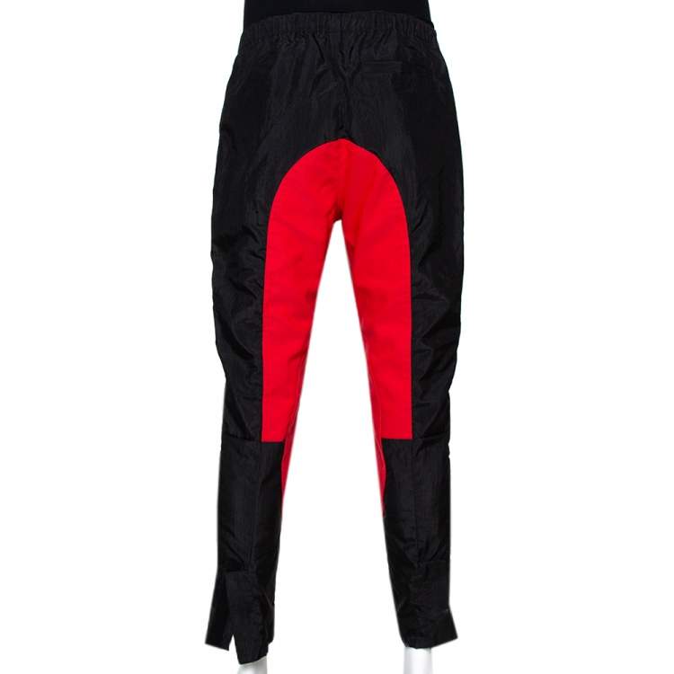 Pre Owned Givenchy Two Tone Logo Print Synthetic Track Pants M