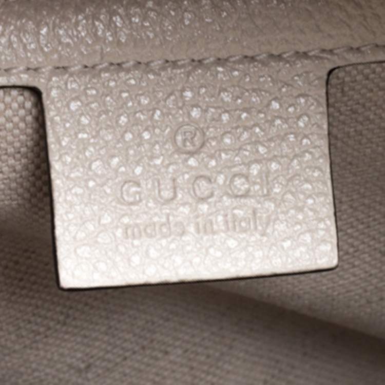 Pre Owned Gucci Off White Leather Logo Print Backpack