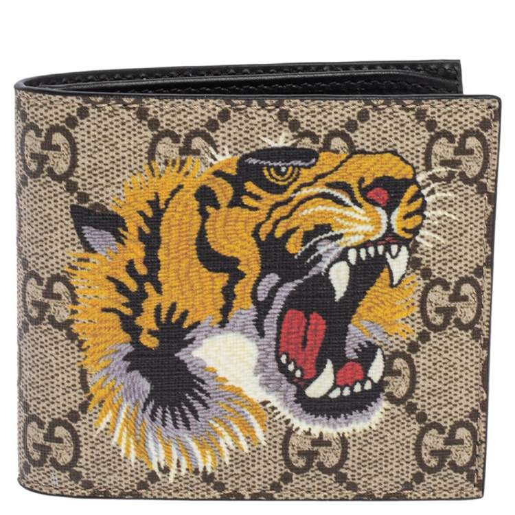 Gucci Tiger Embossed Wallet ($495) ❤ liked on Polyvore featuring men's  fashion, men's bags, men's wallets…