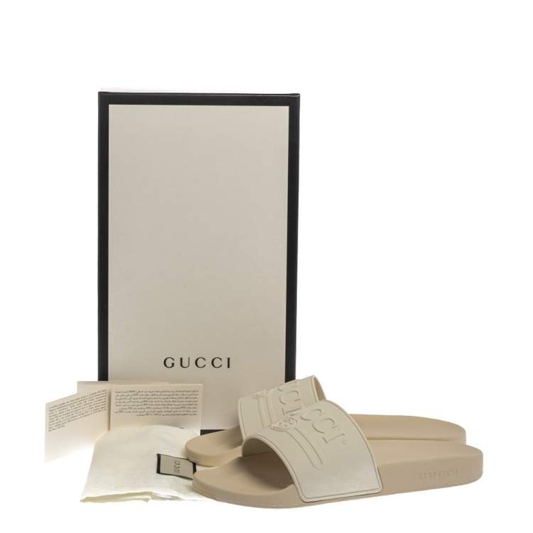 Pre Owned Gucci White Rubber Logo Pursuit Slide Sandals Size 44