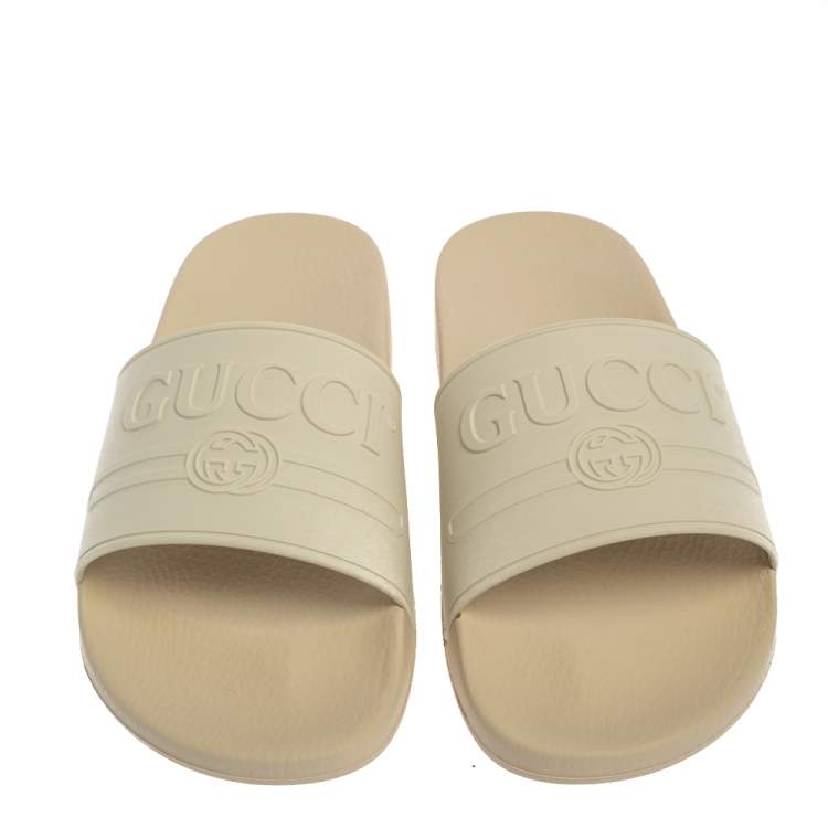 Pre Owned Gucci White Rubber Logo Pursuit Slide Sandals Size 44