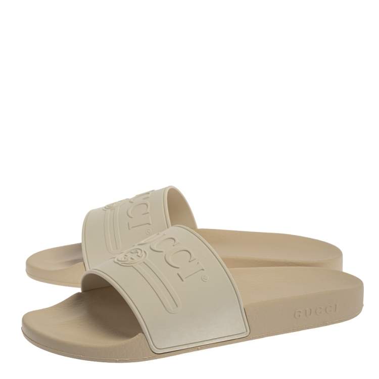Pre Owned Gucci White Rubber Logo Pursuit Slide Sandals Size 44