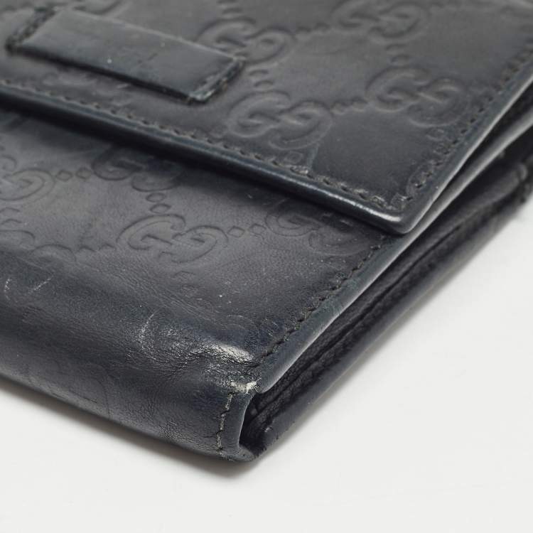 Pre Owned Gucci Black Microguccissima Leather Logo Trifold Wallet