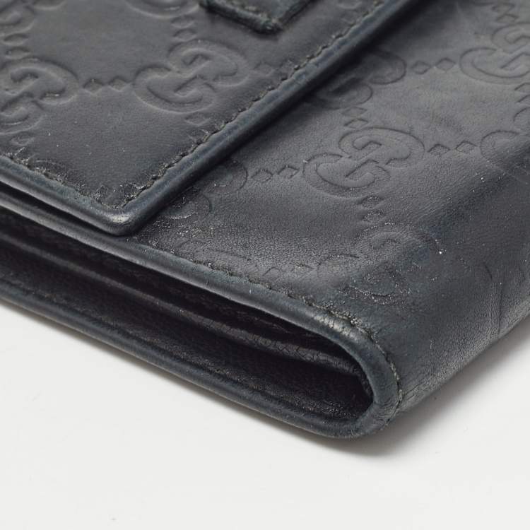 Pre Owned Gucci Black Microguccissima Leather Logo Trifold Wallet
