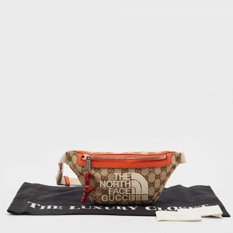 Pre Owned Gucci x The North Face Beige/Orange GG Canvas Belt Bag