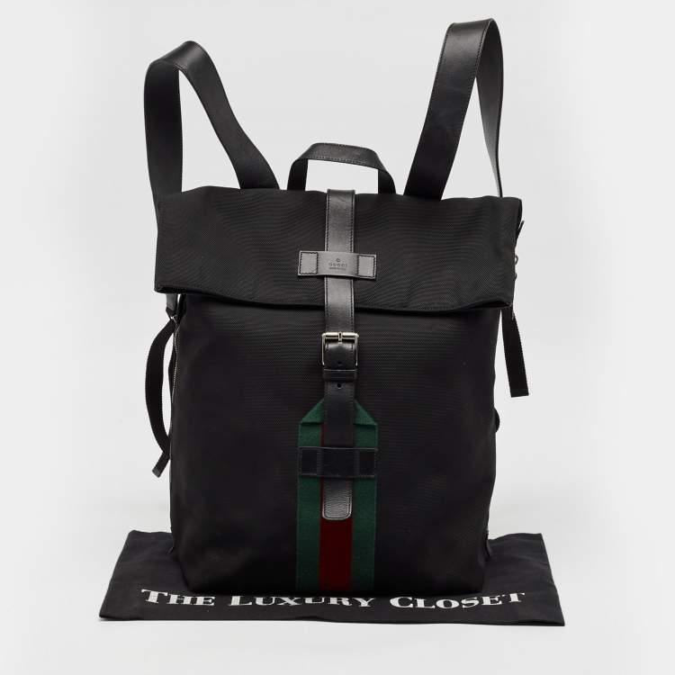 Pre Owned Gucci Black Leather and Nylon Web Fold Over Backpack