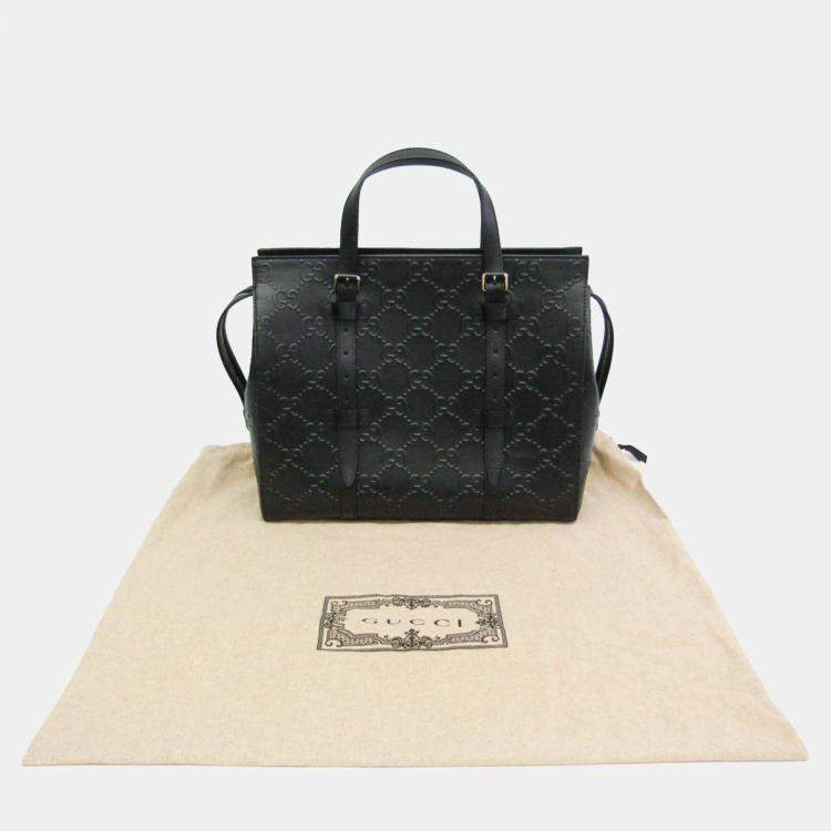 Pre Owned Gucci Black Leather Perforated GG Embossed Tote Bag