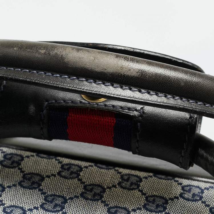 مملوكة مسبقًا حقيبة سفر غوتشي ترانك نسج GG أزرق كحلي/أسود وجلد