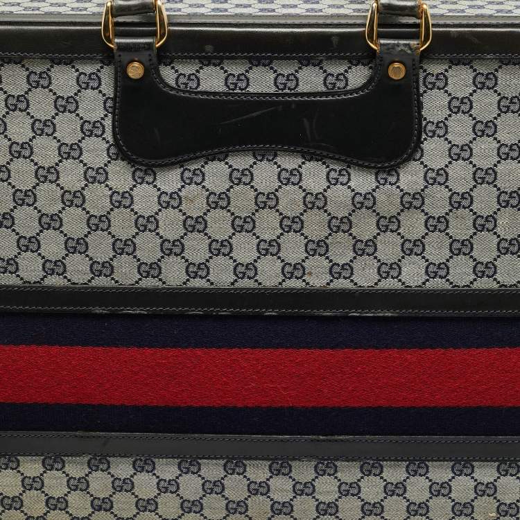 مملوكة مسبقًا حقيبة سفر غوتشي ترانك نسج GG أزرق كحلي/أسود وجلد