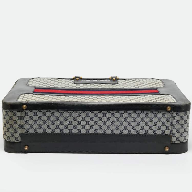 مملوكة مسبقًا حقيبة سفر غوتشي ترانك نسج GG أزرق كحلي/أسود وجلد