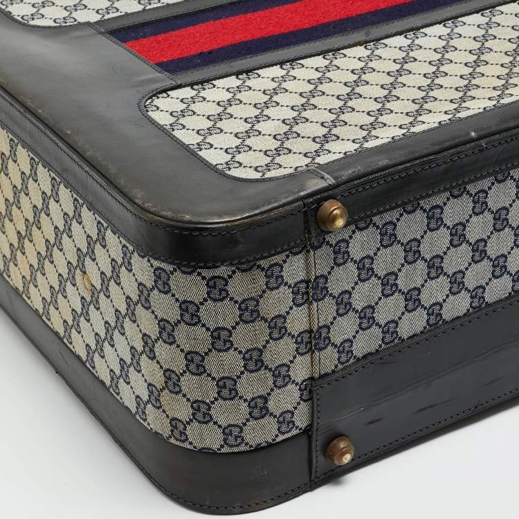 مملوكة مسبقًا حقيبة سفر غوتشي ترانك نسج GG أزرق كحلي/أسود وجلد