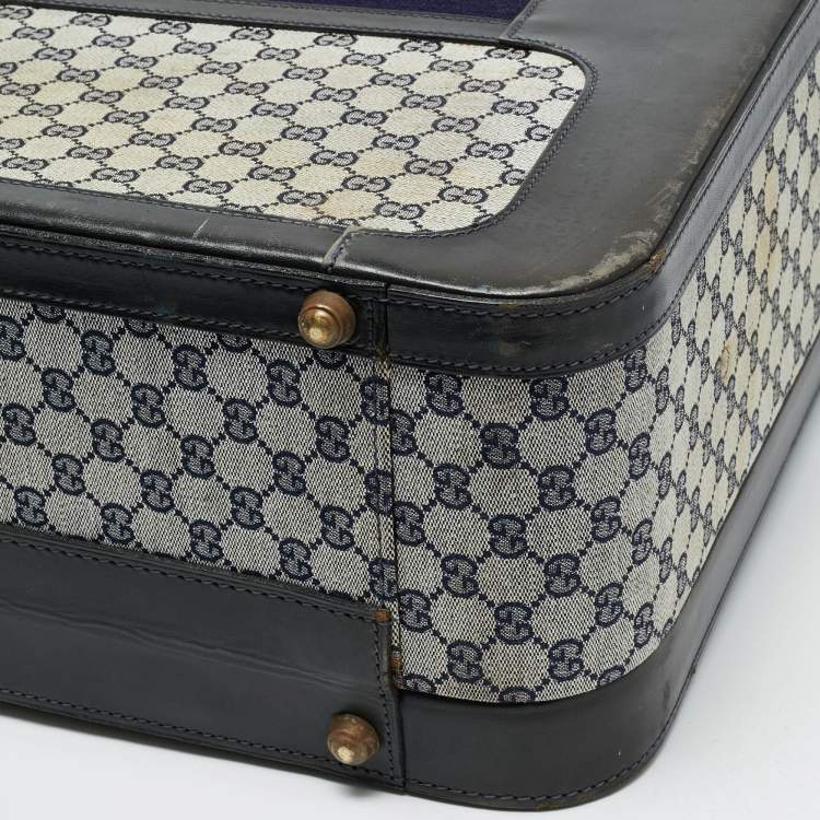 مملوكة مسبقًا حقيبة سفر غوتشي ترانك نسج GG أزرق كحلي/أسود وجلد