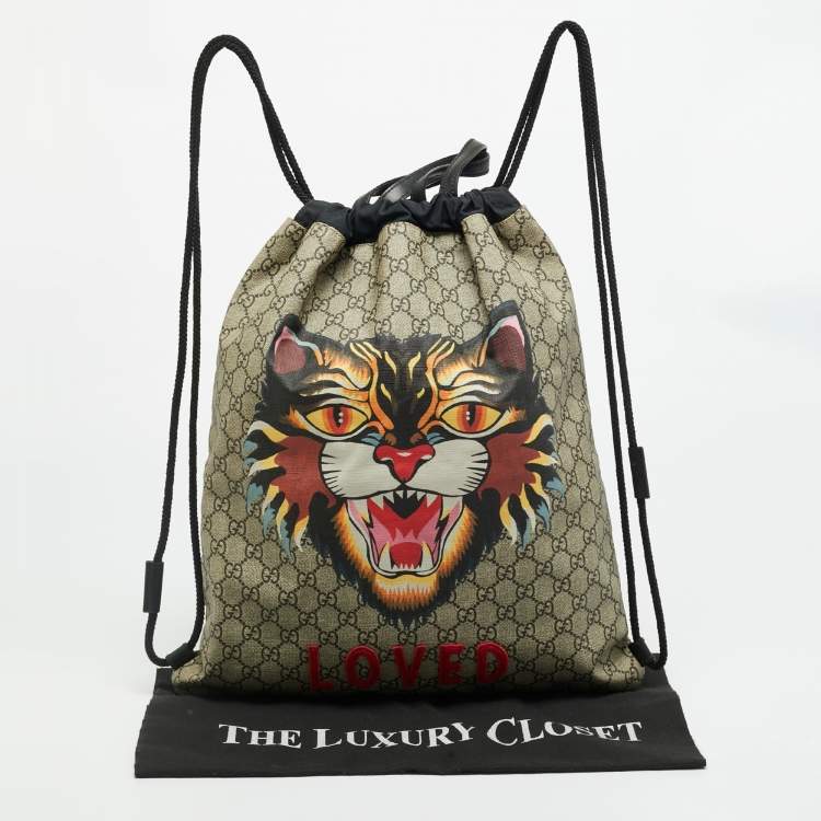 Pre Owned Gucci Angry Cat Beige/Black GG Supreme Canvas and Fabric Drawstring Backpacks