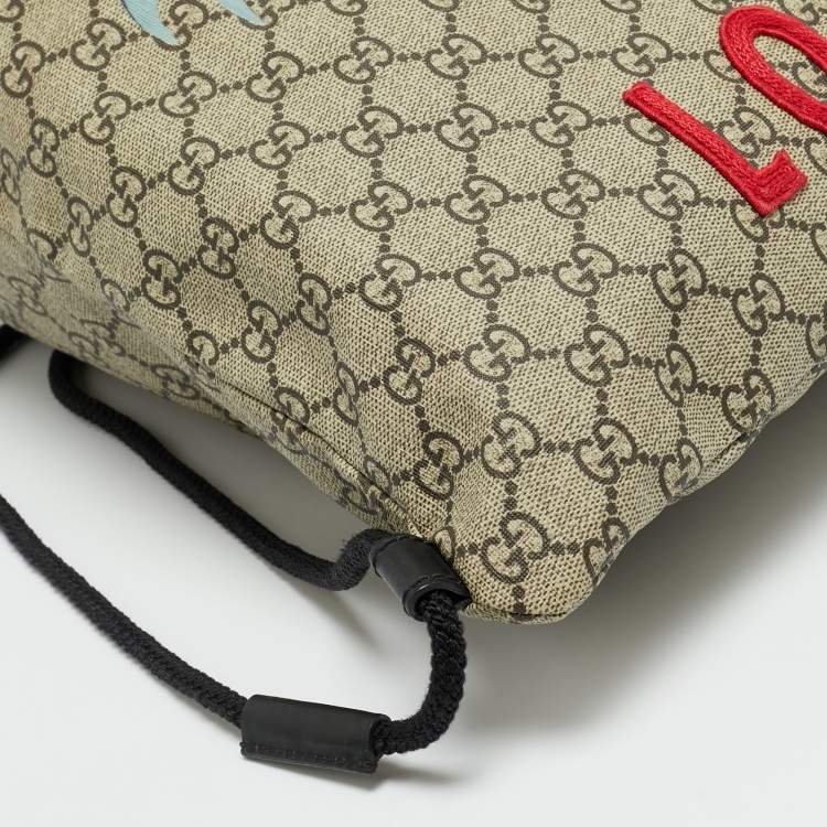 Pre Owned Gucci Angry Cat Beige/Black GG Supreme Canvas and Fabric Drawstring Backpacks