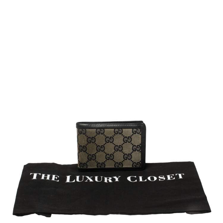 مملوكة مسبقًا Gucci Beige/Navy Blue GG Canvas and Leather Bifold Wallet