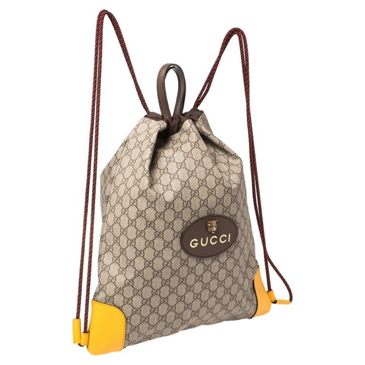 Pre Owned Gucci Beige/Mustard GG Supreme Canvas and Leather Neo Vintage Drawstring Backpack
