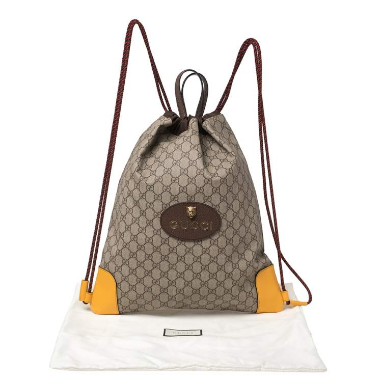 Pre Owned Gucci Beige/Mustard GG Supreme Canvas and Leather Neo Vintage Drawstring Backpack