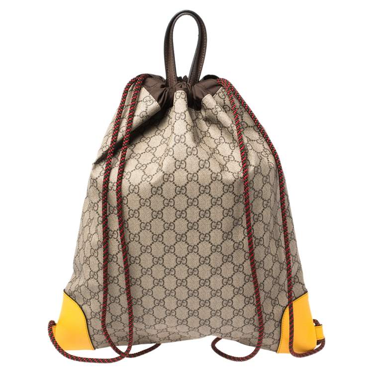 Pre Owned Gucci Beige/Mustard GG Supreme Canvas and Leather Neo Vintage Drawstring Backpack