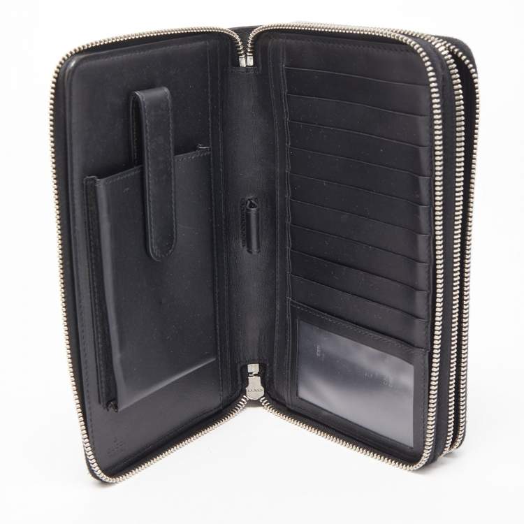 Pre Owned Gucci Black/Beige Printed GG Supreme and Leather Zip Around Travel Clutch