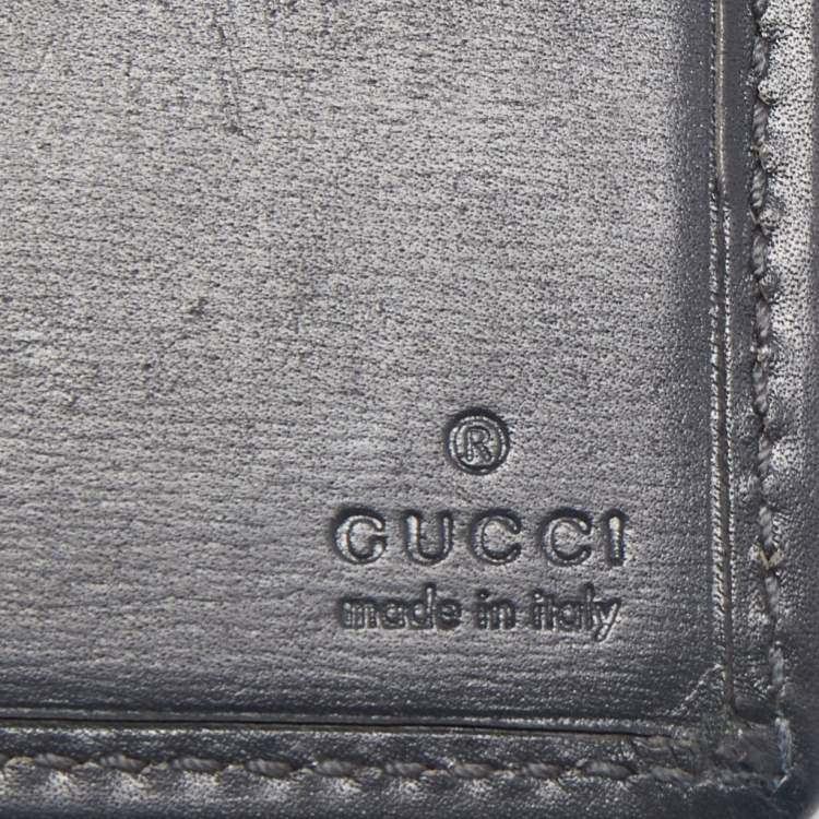Pre Owned Gucci Beige/Black GG Supreme Canvas and Leather Bifold Wallet