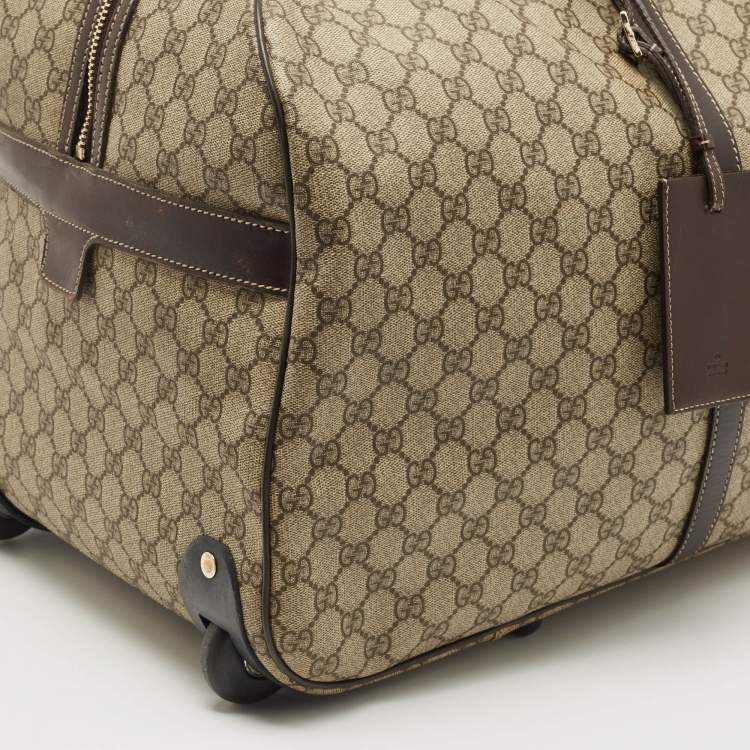 Pre Owned Gucci Dark Brown/Beige GG Supreme Canvas 2 Wheel Duffle Luggage Bag