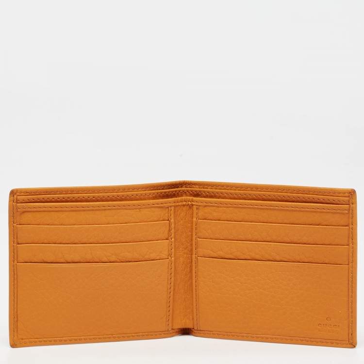 Pre Owned Gucci Orange Leather Interlocking G Bifold Wallet