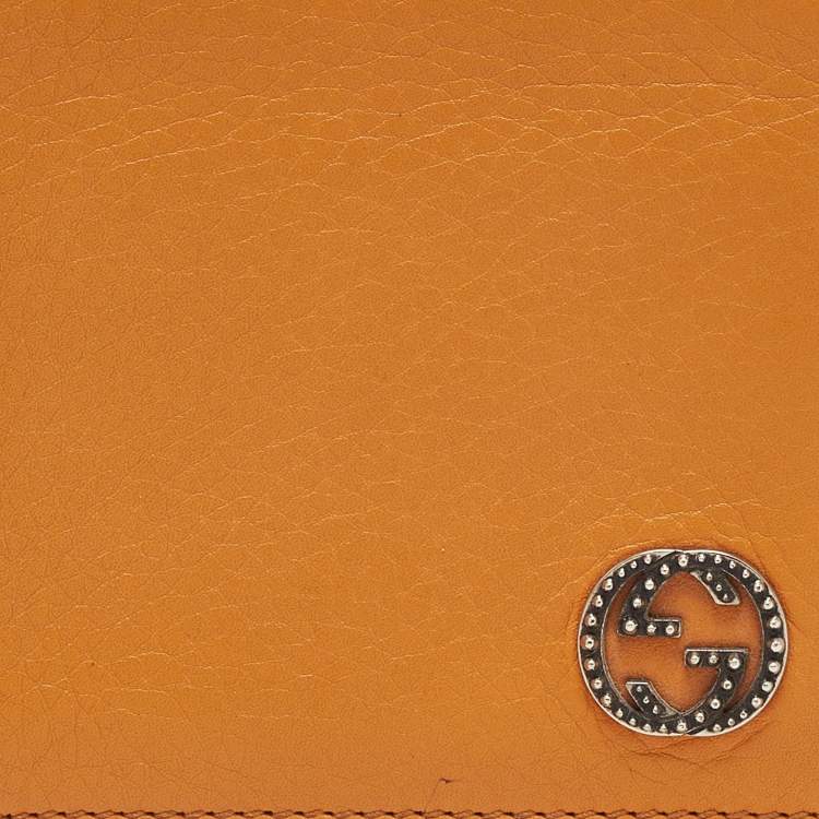 Pre Owned Gucci Orange Leather Interlocking G Bifold Wallet