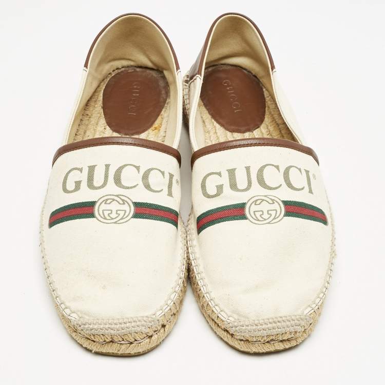 Pre Owned Gucci Off White Canvas Logo Graphic Print Slip On Espadrilles Size 43