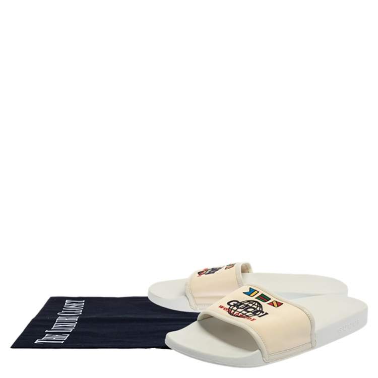 Pre Owned Gucci White Logo Print Canvas Slip On Slides Size 43