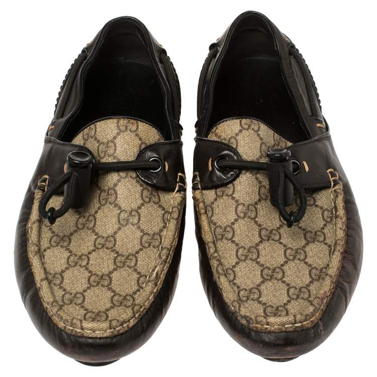Pre Owned Gucci Beige/Brown Coated Canvas And Leather Toggle Cord Loafers Size 44.5