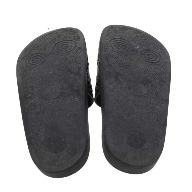 Pre Owned Gucci Black GG Cutout Rubber Pursuit Flat Slides Size 42