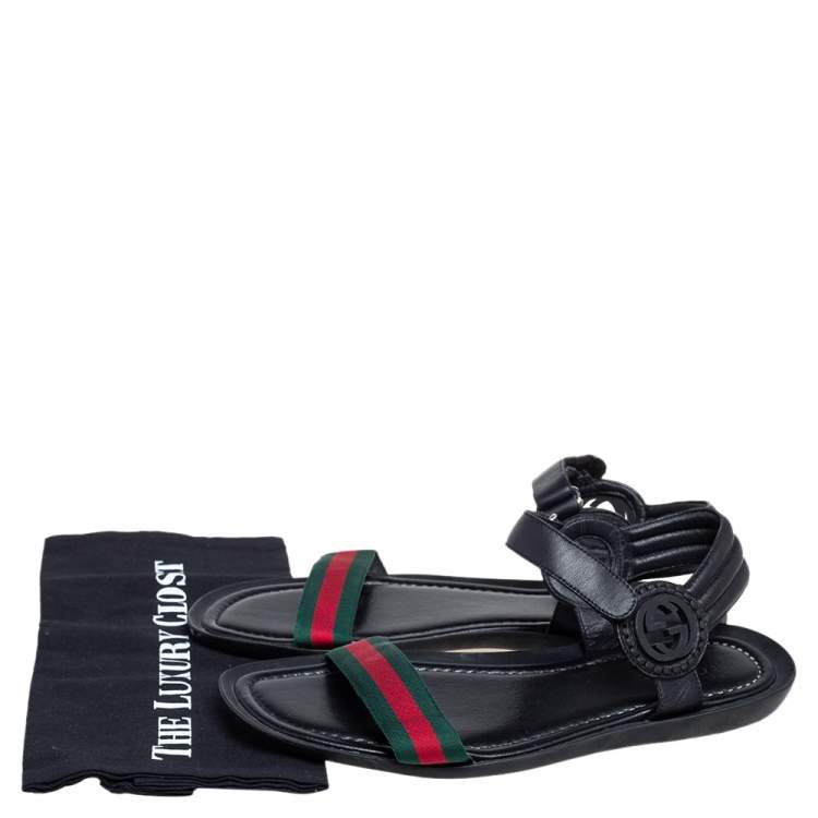 Pre Owned Gucci Black Leather and Canvas Web Ankle Strap Flat Sandals Size 42