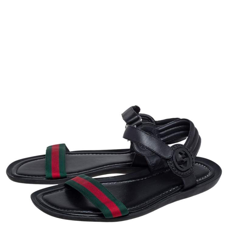 Pre Owned Gucci Black Leather and Canvas Web Ankle Strap Flat Sandals Size 42