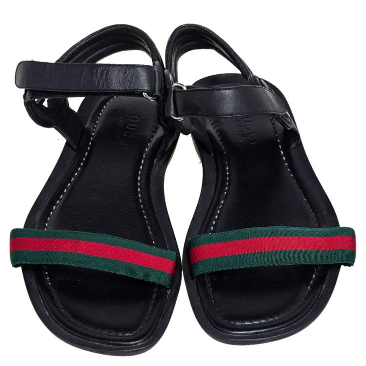 Pre Owned Gucci Black Leather and Canvas Web Ankle Strap Flat Sandals Size 42
