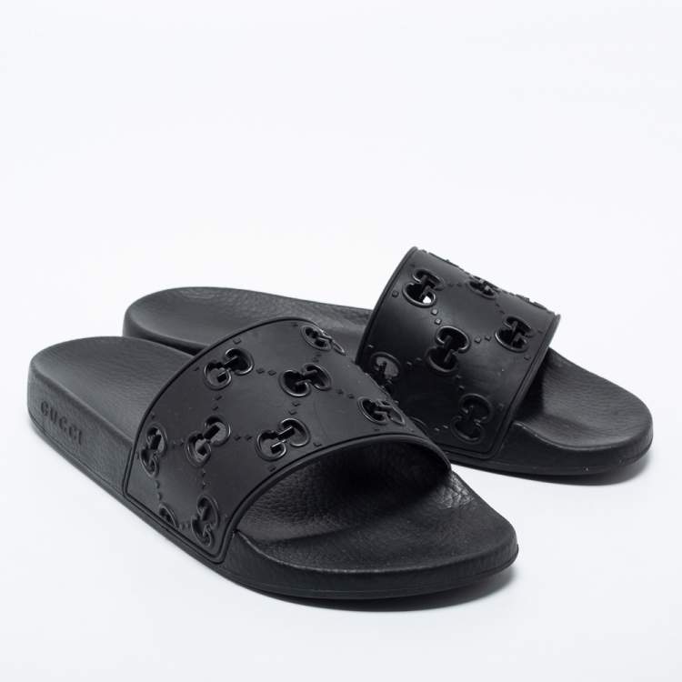 Pre Owned Gucci Black GG Laser Cut Rubber Slides Size 42