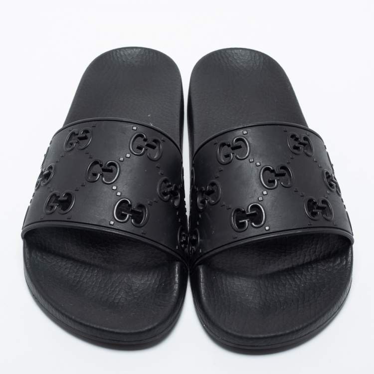 Pre Owned Gucci Black GG Laser Cut Rubber Slides Size 42