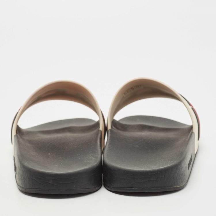 Pre Owned Gucci Cream Rubber Logo Slide Flats Size 44