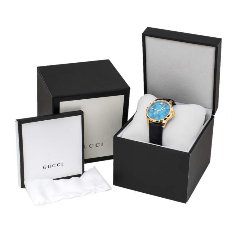 Pre Owned Gucci Turquoise Blue Gold Tone Stainless Steel Leather G-Timeless 126.4 Men's Wristwatch 38 mm