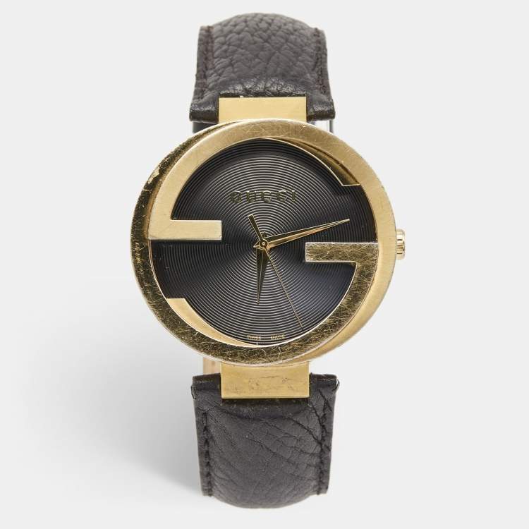 Pre Owned Gucci Black Gold Plated Stainless Steel Leather Interlocking Latin Grammy's XL Special Edition YA133208 Men's Wristwatch 42 mm