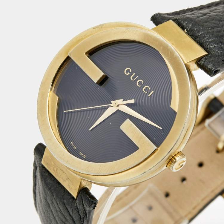 Pre Owned Gucci Black Gold Plated Stainless Steel Leather Interlocking Latin Grammy's XL Special Edition YA133208 Men's Wristwatch 42 mm