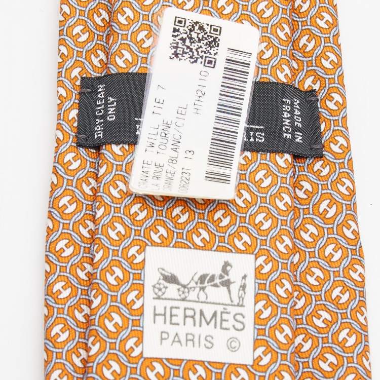 Pre Owned Hermès Orange 7 La Roue Tourne Printed Silk Slim Tie