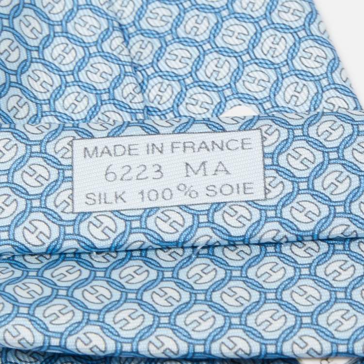 Pre Owned Hermès Blue La Roue Tourne Printed Silk Slim Tie