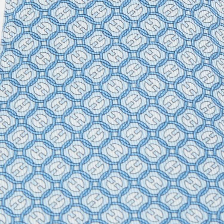 Pre Owned Hermès Blue La Roue Tourne Printed Silk Slim Tie