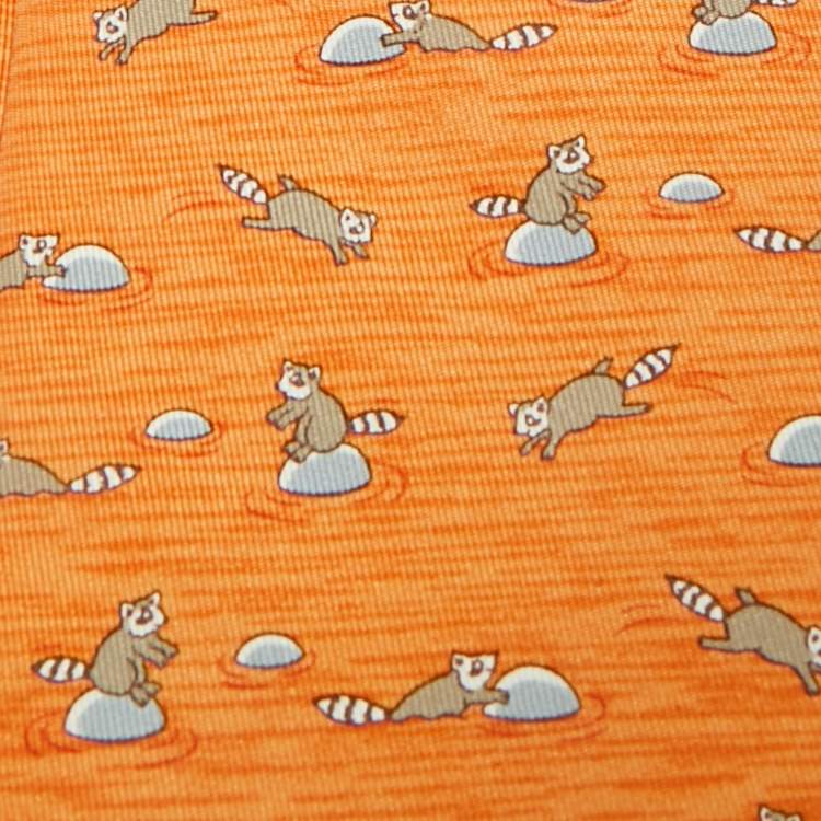 Pre Owned Hermès Orange Raccoon Print Silk Tie